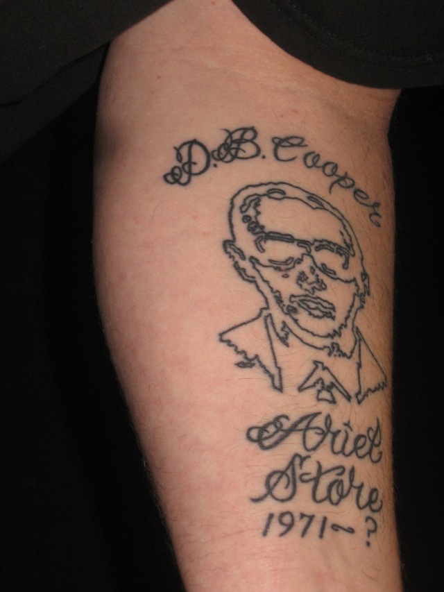 Book, p 478, DB Cooper, tattoo, text only